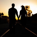 Engagement Couple on Railroad Tracks